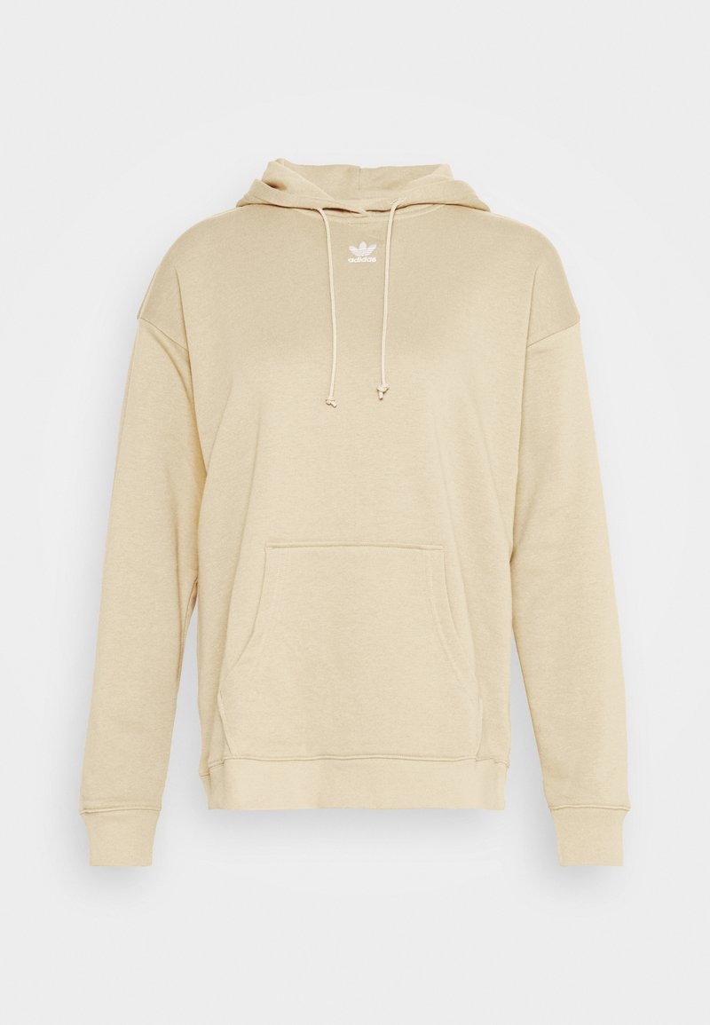 Sudadera con capucha beige hecha de tela suave, con un bolsillo frontal, cordones ajustables y un logo blanco en el pecho.