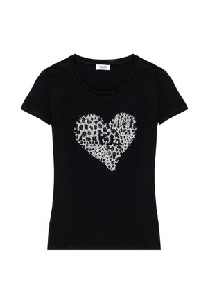 T-shirt noir à manches courtes et encolure ronde avec un design de cœur scintillant en strass. Matière en coton lisse.