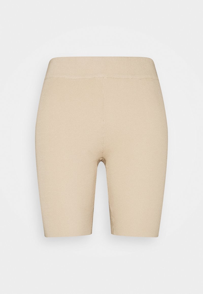 Shorts de biker beige en tricot côtelé à taille haute avec une ceinture élastique, présentés sur un fond blanc.