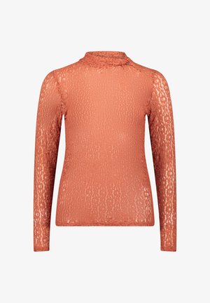 Top à manches longues en dentelle corail, présentant un motif texturé et une coupe près du corps. Matériau doux et léger avec une finition lisse.