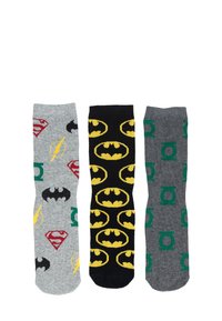 Three pairs of socks: gray with red and green superhero logos, black with yellow Batman symbols, gray with green Green Lantern logos.