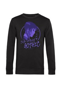Zwarte sweatshirt met een paarse afbeelding van het profiel van een meisje omringd door vogels, met de tekst "SUB-URBAN GOTHIC" in vetgedruckte letters.