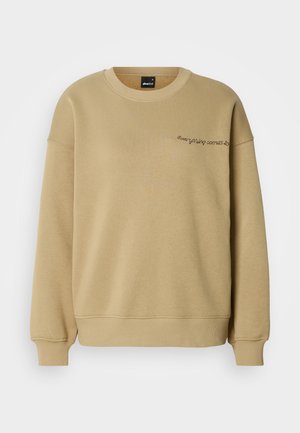 Kahaki huppari, jossa on pyöreä kaula-aukko, pitkät hihat, joustavat hihansuut ja helma. Edessä pieni brodeerattu teksti.