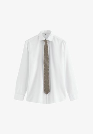 White long-sleeve dress shirt with pointed collar paired with a slim, textured brown tie featuring small light blue dots.