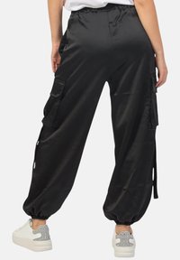Disclaimer Pantaloni cargo - nero