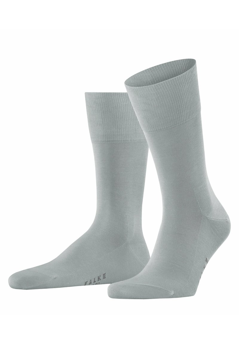 Calzini grigi chiari con polsino a coste, realizzati in un materiale liscio e elastico, con punta e tallone rinforzati e logo del brand.