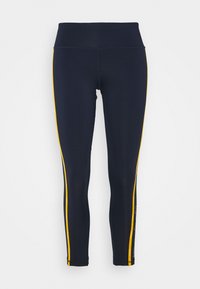 Niebieskie legginsy z wysokim stanem, z żółtymi bocznymi paskami i akcentami marki. Wykonane z elastycznego, gładkiego materiału dla maksymalnego komfortu.