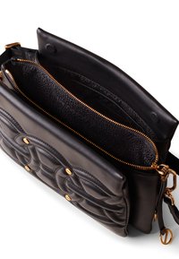 Black leather crossbody bag with quilted pattern, gold hardware accents, and a lined interior featuring multiple compartments and a zip closure.