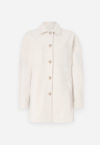 Light beige button-up jacket made of soft fabric. Features two front pockets, a collared neck, and a relaxed fit. Smooth texture.