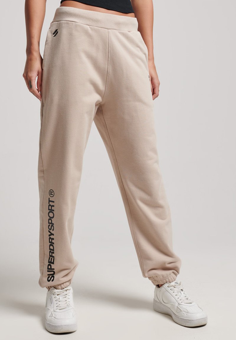 Superdry SPORT CORE Tracksuit bottoms chateau gray/beige Zalando