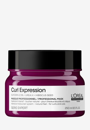 Curl Expression professional hair mask, 250 ml, in a purple jar with a black lid. Features white text detailing ingredients and usage.