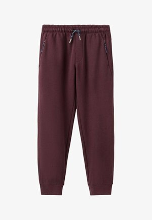 Pantalon de survêtement marron foncé à coupe ajustée, avec une taille élastique et un cordon de serrage. Dispose de deux poches latérales et de poignets côtelés aux chevilles.