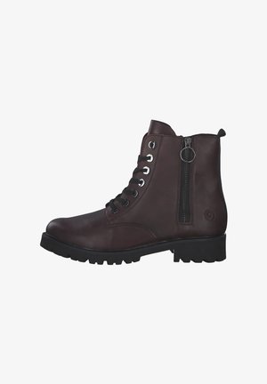 Braune Leder Stiefeletten mit Metallösen, Schnür vorne und seitlichem Reißverschluss. Featuring strukturierten Sohlen und verstärkten Nähten.