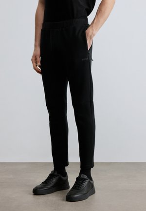 TOUR LONG - Pantalon de survêtement - black