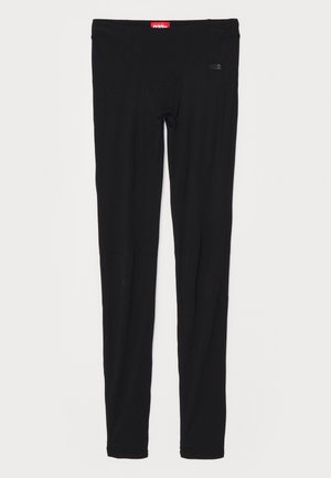 Black leggings made of smooth fabric, featuring a high waistband and subtle branding on the front. Leggings have a slim, fitted shape.