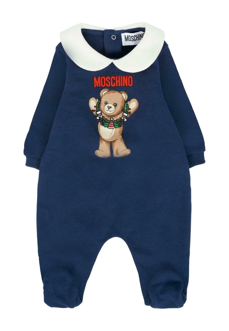 Romper per neonati blu navy con colletto Peter Pan bianco, grafica di un orsetto che indossa una corona festiva e testo "Moschino" rosso sul petto.
