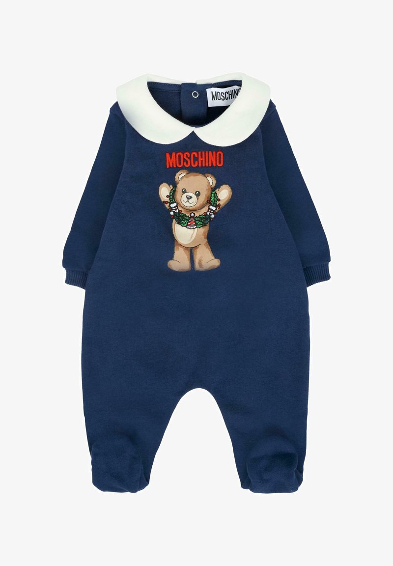 Romper per neonati blu navy con colletto Peter Pan bianco, grafica di un orsetto che indossa una corona festiva e testo "Moschino" rosso sul petto.