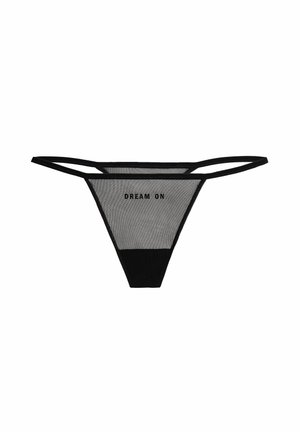 Black mesh thong with "DREAM ON" text, featuring thin straps and a contrasting solid black front panel. Lightweight and sheer texture.