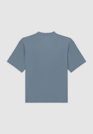 T-shirt met korte mouwen van zacht, lichtblauw stof met een ronde hals en een relaxed fit. Soepele textuur, geen zichtbare patronen of logo's.