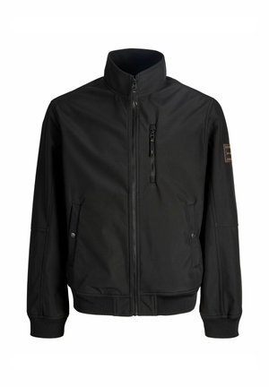 Veste noire zippée avec col montant, poche zippée sur la poitrine, deux poches latérales à boutons-pression, poignets côtelés et petite écusson sur la manche gauche.