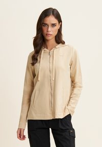 Freddy CON CAPPUCCIO ANIMALIER E ZIP FRONTALE - Sudadera con cremallera - irish cream zebra animalier