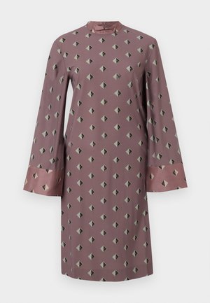 Long-sleeve dress in dusty rose fabric featuring a geometric diamond pattern in dark gray and black, with contrasting satin cuffs.
