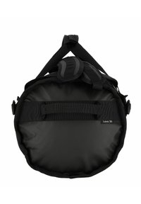 Borsa rotonda nera con una superficie liscia e strutturata, spallacci regolabili e un piccolo etichetta con la scritta "Lava 30" sul fronte.