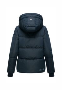 Navy puffer jacket with a hood, featuring quilted sections, ribbed cuffs, and a logo on the back. Smooth, water-resistant fabric.