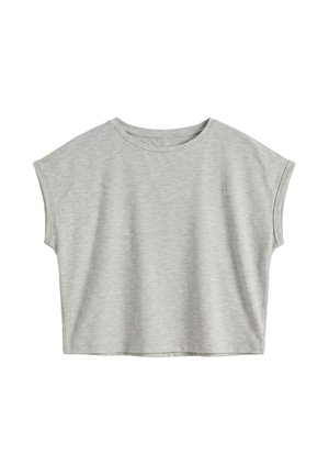 T-shirt court gris clair à manches courtes avec un col rond et des bords de manches retroussés, présenté sur fond blanc.