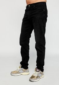 Rethink Stat Jeans a sigaretta - schwarz