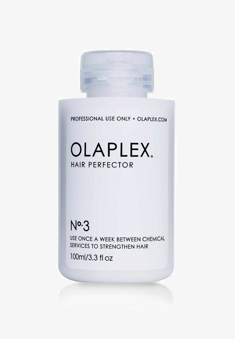 Olaplex Hair Perfector No. 3 in een witte cilindrische fles, met een doorzichtige dop; etiket met gebruiksinstructies in zwarte tekst.