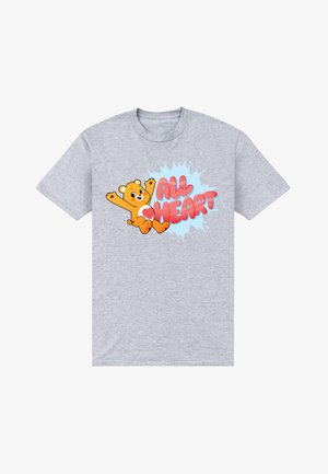 Szara koszulka z pomarańczowym rysunkowym misiem z detalami serc oraz napisem „ALL HEART” dużymi czerwonymi literami na niebieskim tle przypominającym plamę.