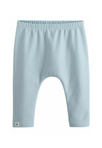 Pantalon pour bébé bleu clair avec un waistband élastique et une petite patch étoile près de l'ourlet inférieur sur une jambe.