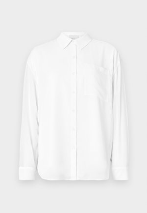 White long-sleeve shirt made of smooth fabric, featuring a classic collar, button front, and a chest pocket on the left side.