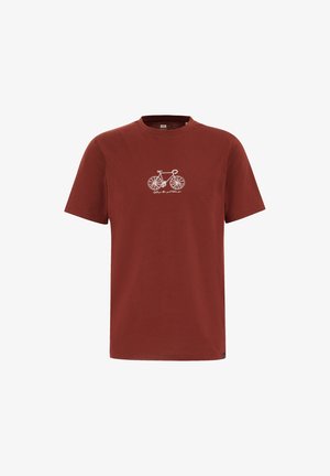 Rød bomulds t-shirt med rund hals, korte ærmer og et hvidt cykelgrafik på forsiden. Enkel design, afslappet pasform.