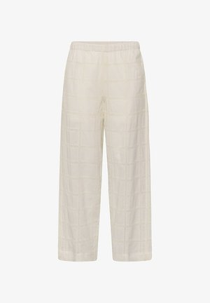 Locker sitzende, cremeweiße Hose mit elastischem Bund und dezentem quadratischem Lochmuster im gesamten Stoff.