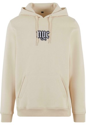 Beżowa bluza z kapturem z przednią kieszenią typu kangur, z czarnym haftowanym logo "nyc" na klatce piersiowej. Materiał mieszanka bawełny, ściągacze przy mankietach.