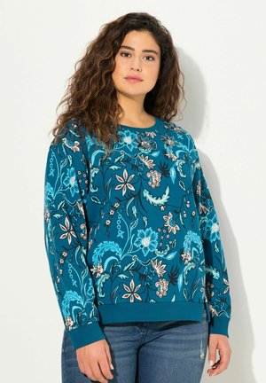 Felpa floreale turchese con maniche lunghe, caratterizzata da un vivace motivo floreale blu e beige, polsini e orlo a coste e scollatura rotonda.