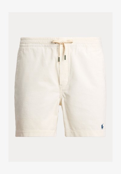 Μπεζ μαγιό σε σορτς με κάθετες ρίγες, ελαστική μέση και κορδόνι για δέσιμο. Διαθέτει ένα μικρό μπλε λογότυπο στο αριστερό πόδι.