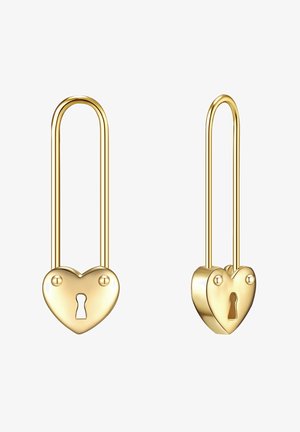 Cadenas en forme de cœur dorées avec des motifs de trou de serrure, présentant une texture lisse et des bords arrondis, fixées à des boucles allongées.