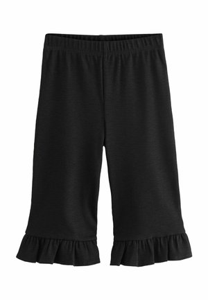 Schwarze, gerippte, kurze Hose mit elastischem Bund und gerafften Säumen.