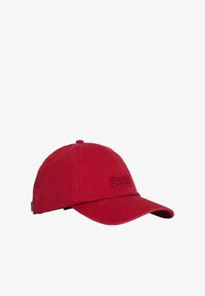 Red cotton cap with a curved brim, embroidered logo on the front, ventilation holes, and adjustable strap at the back.