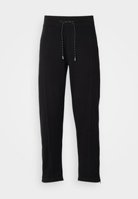 DONETTO - Tracksuit bottoms - black