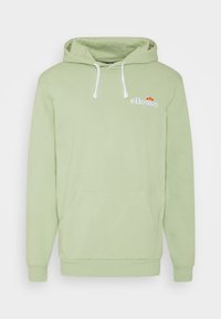 Felpa verde chiaro realizzata in tessuto morbido, caratterizzata da una tasca a canguro frontale, cordini bianchi e un logo ricamato sul petto.