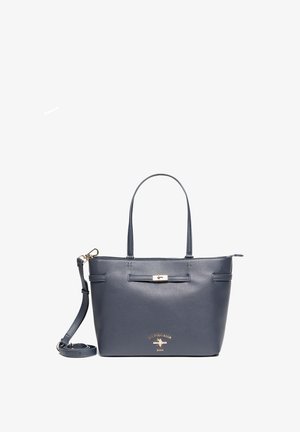 Bolsa tote texturizada de U.S. Polo Assn. en azul marino con doble asa, correa de hombro desmontable y detalles dorados en el logo y el broche.