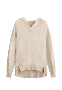 Beige gebreide trui met een v-hals, oversized pasvorm, lange mouwen, zijslits en ribgebreide manchetten en zoom. Zachte textuur, casual ontwerp.