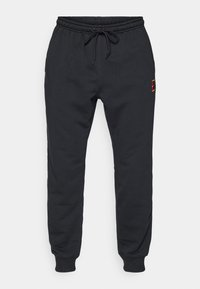 NIKECOURT HERITAGE PANT JOGGER - Pantalon de survêtement - black