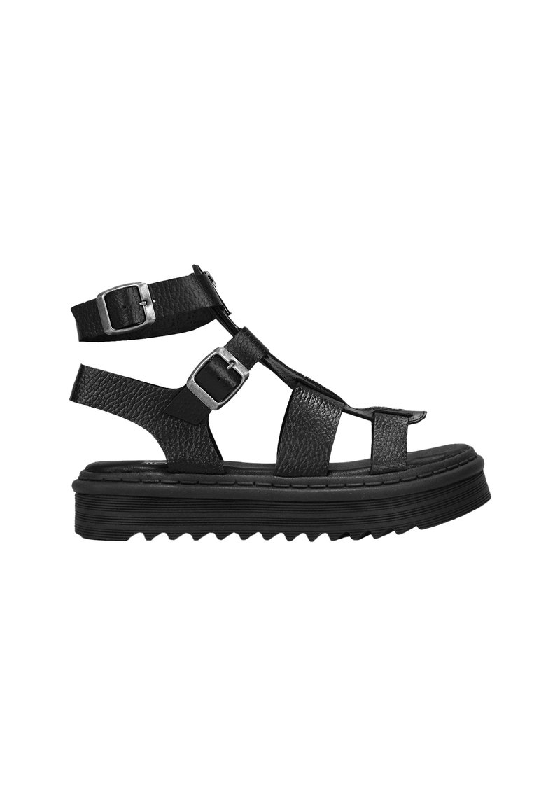 Sandalias de cuero negro con múltiples correas, detalles de hebilla, una suela texturizada gruesa y un diseño de plataforma resistente.