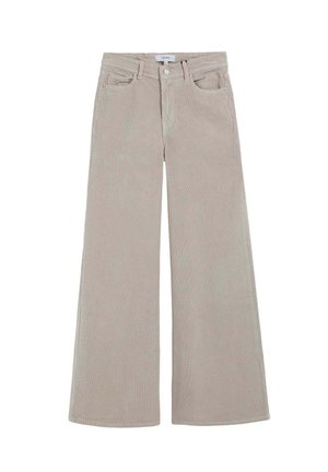 Pantalones de pana anchos en color beige claro con bolsillos, cierre de botón y un relieve texturizado de estrías verticales en toda la tela.