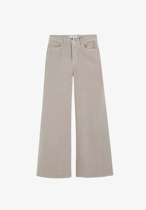 Pantalones de pana anchos en color beige claro con bolsillos, cierre de botón y un relieve texturizado de estrías verticales en toda la tela.